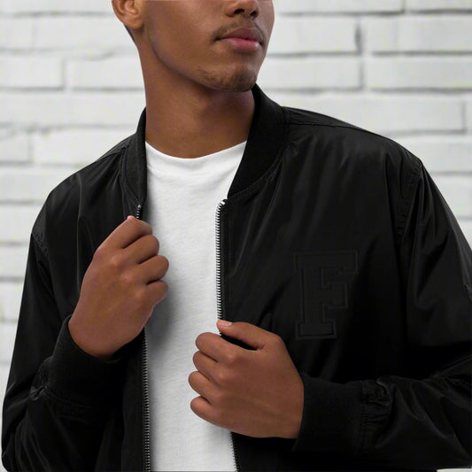 Stealth Bomber Forward - GoBoi Store -  Stealth mode on. Classic bomber jacket with embroidered black-on-black F. This black bomber packs a punch with a discreet letter patch that whispers your position.