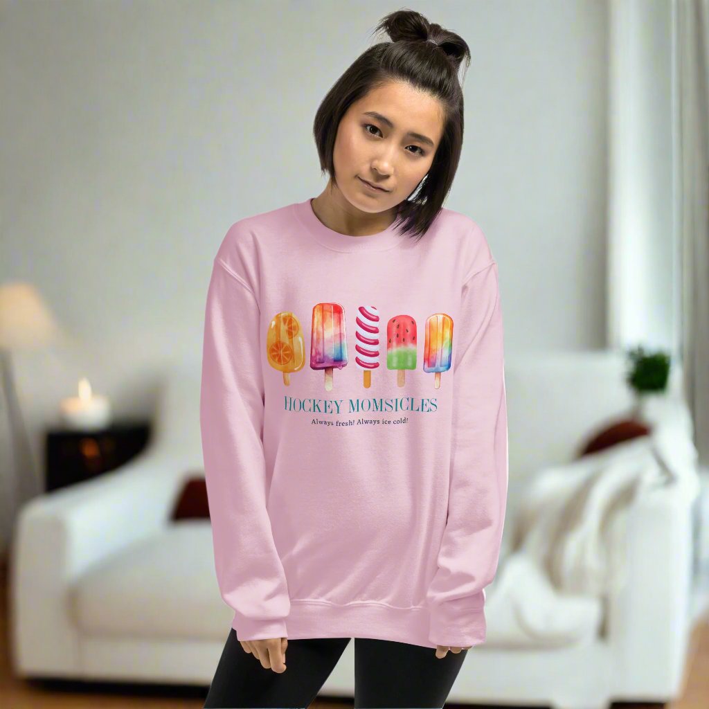 Hockey Momsicles Sweatshirt - GoBoi Store - Hockey Momsicles: Masters of the Ice and Style! With unparalleled grace and unwavering determination, Hockey Momsicles conquer the freezing conditions of the rink while looking absolutely stunning. A sturdy and warm sweatshirt bound to keep you warm in the colder months. A pre-shrunk, classic fit sweater that’s made with air-jet spun yarn for a soft feel.