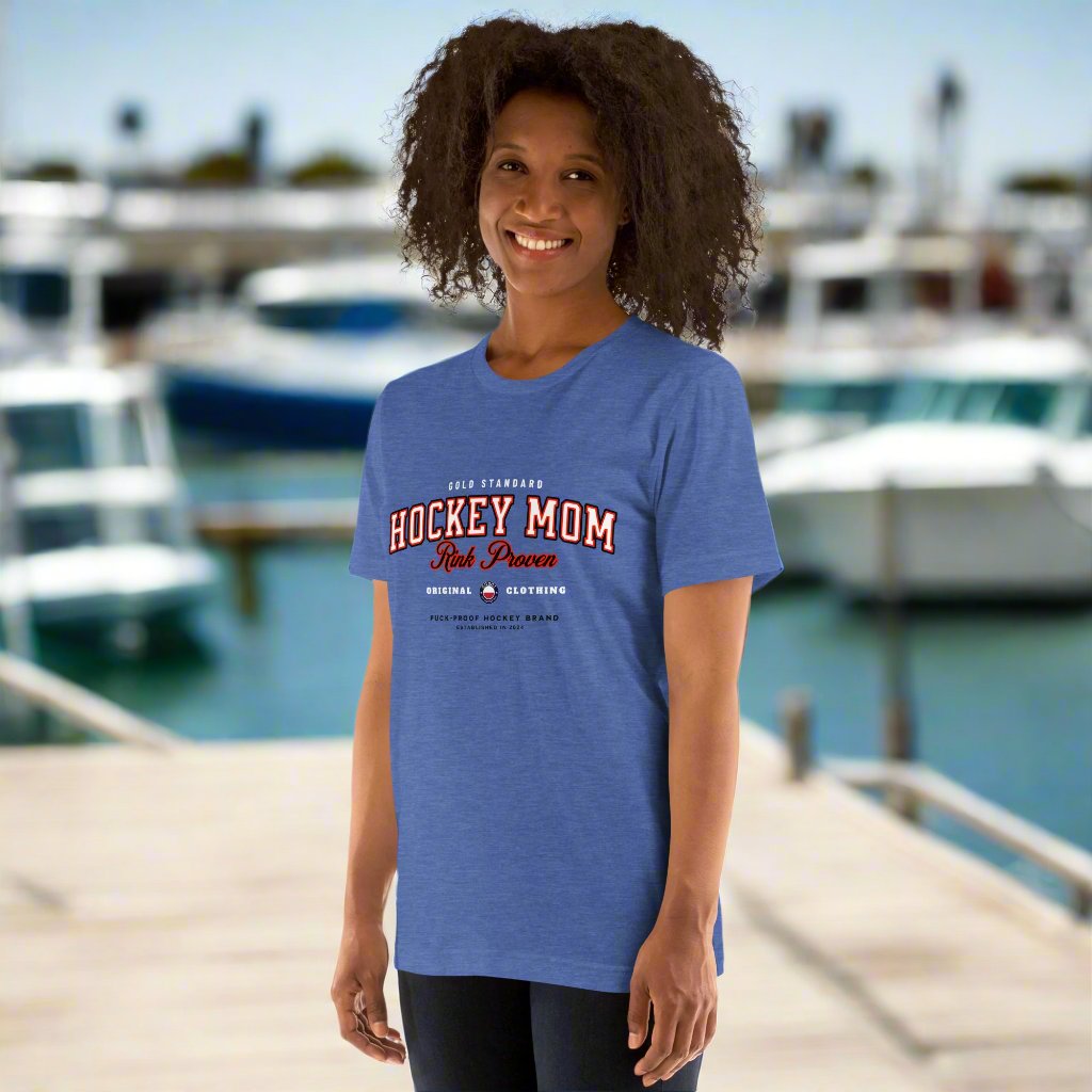 Rink Proven Hockey Mom tee - GoBoi Store - For the moms who’ve seen it all—early mornings, rink-side cheers, and endless gear hauls. This classic varsity-style tee shows you’re not just any hockey mom; you’re rink proven. Wear it with pride Everyone needs the perfect t-shirt to complement an everyday, laid-back look. The ideal top for so many occasions, this lightweight cotton tee will keep you comfy and looking smart.