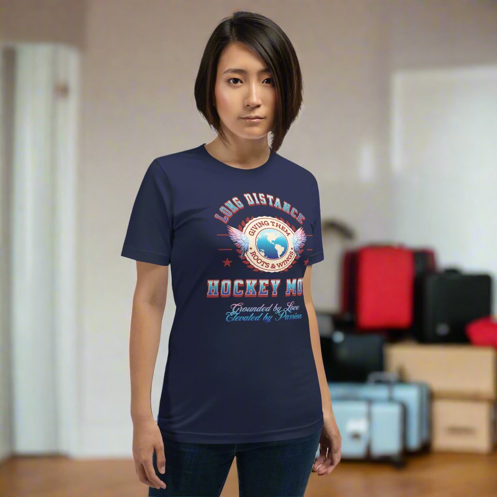 Long Distance Hockey Mom tee - GoBoi Store - Designed for the proud mom whose player is chasing dreams far from home, it symbolizes giving them roots and wings. Celebrate your unbreakable bond and support as they soar on their hockey journey, knowing you're always cheering them on from afar! This t-shirt is everything you've dreamed of and more. It feels soft and lightweight, with the right amount of stretch. It's comfortable and flattering for all.