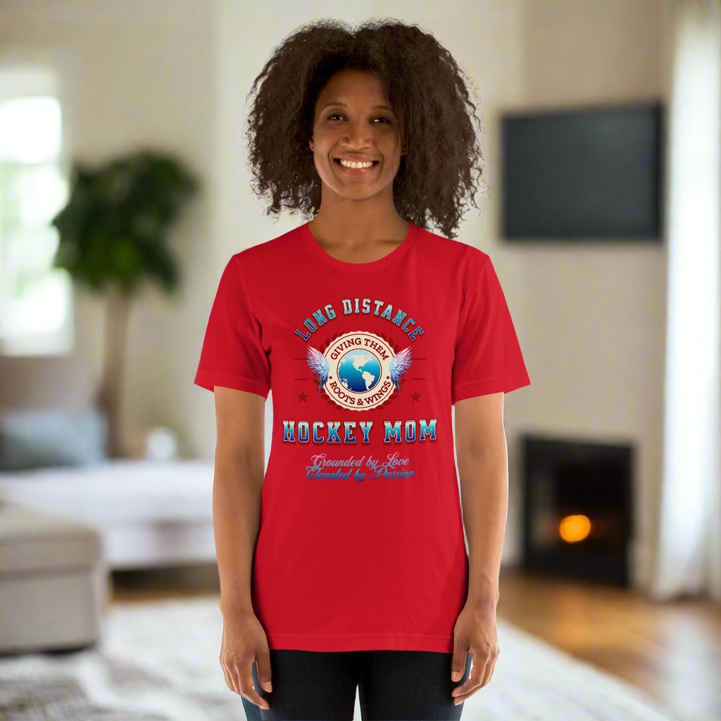Long Distance Hockey Mom tee - GoBoi Store - Designed for the proud mom whose player is chasing dreams far from home, it symbolizes giving them roots and wings. Celebrate your unbreakable bond and support as they soar on their hockey journey, knowing you're always cheering them on from afar! This t-shirt is everything you've dreamed of and more. It feels soft and lightweight, with the right amount of stretch. It's comfortable and flattering for all.