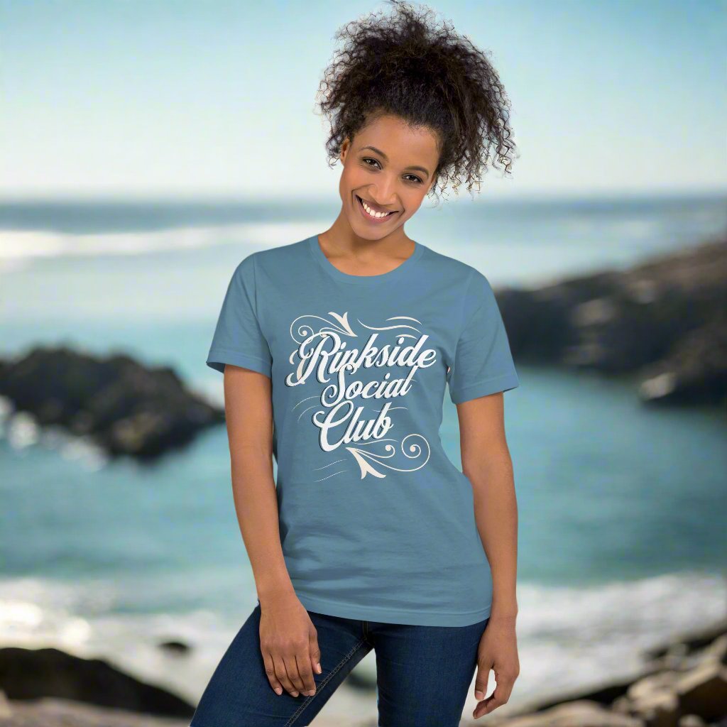 Rinkside t-shirt - GoBoi Store - Welcome to the Rinkside Social Club where the rink is more than just a place – it's a way of life! It's where lifelong friendships are forged and where the purest form of athletic life unfolds. This t-shirt is everything you've dreamed of and more. It feels soft and lightweight, with the right amount of stretch. It's comfortable and flattering for all.
